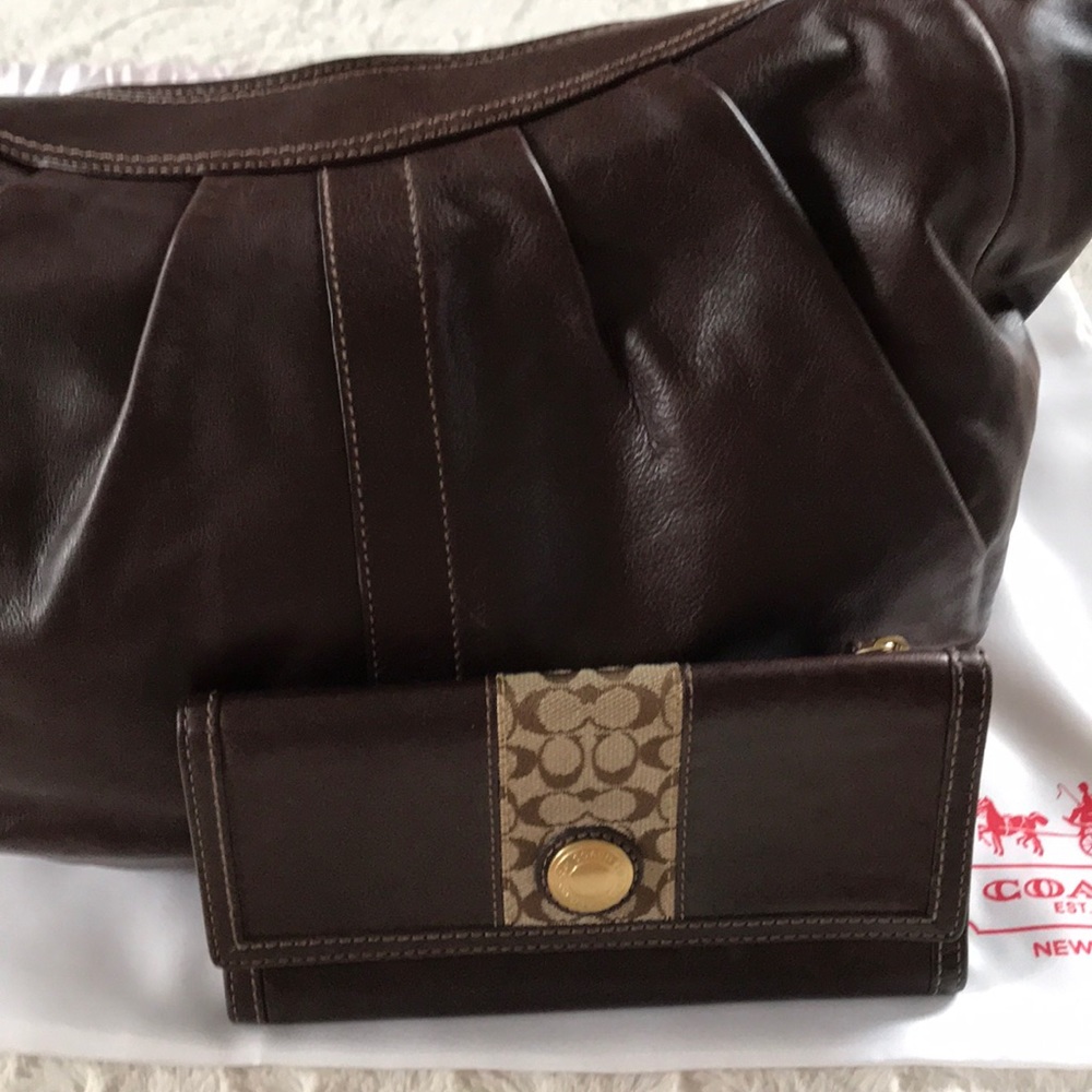Coach Vintage Rare Brown Leather Large hobo bag with wallet like new.